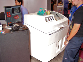Illustration for article titled Mcor Matrix 3D Printer Replicates Objects on the Cheap With Simple Paper and Glue